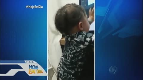 Baby laughs when he gets scolded by his father. What a treat