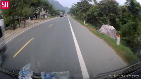 Two Trucks Avoid Clueless Pedestrian