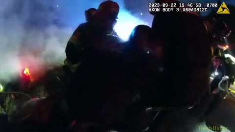 Body cam video shows police, firefighters pulling unconscious driver from burning car