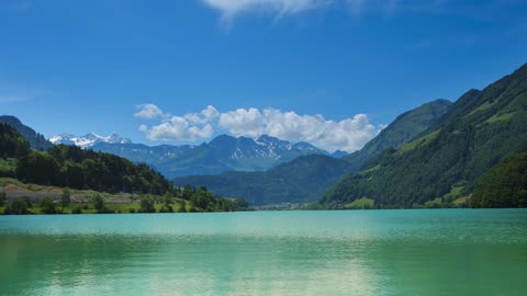 Lake water surface clouds free stock video. Free for use & download.