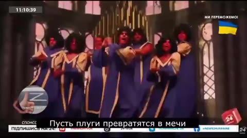 Ukrainians dressed as Devils dancing in the Church, wishing death to Russians on Xmas Eve! 😈🎄