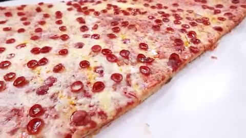 This is a largest pizza in the world 🍕🍕