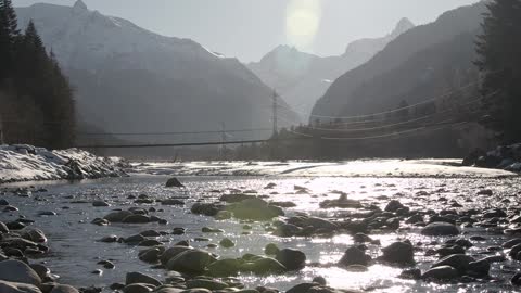 River Flowing Over The Rocks