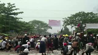 Yangon protesters defiant as five killed in Myanmar