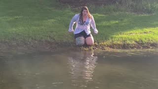 Woman Pulls Off Knee Slide Faceplant Into Lake