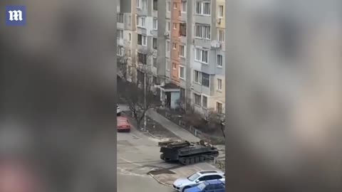 Russians in Ukraine_ Tank is filmed driving through a quiet residential area in Kyiv