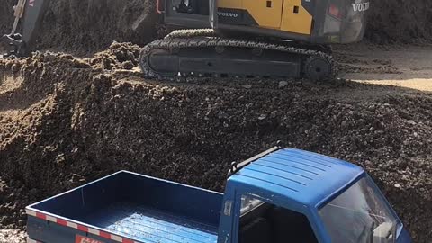 rc excavator and truck working 2021