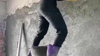 Young girl with great cement morter skills