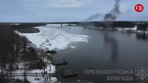 After constructing bridges, presidential guard combatants attack Russians.