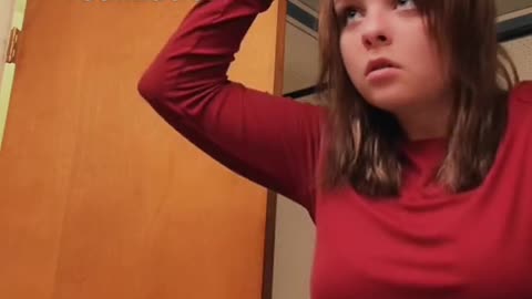 Girl Cutting Fake Bangs Realizes She is Also Cutting Her Hair