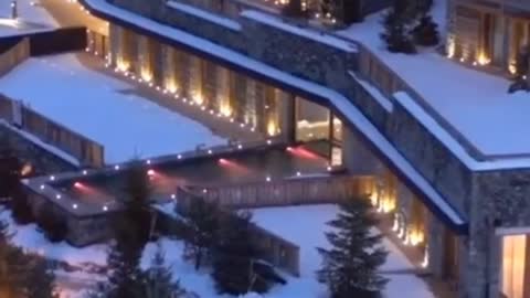 would you love to swim at this incredible chalet in the Alps after a day of skiing?
