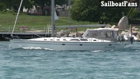 Serendipity Sailboat Cruising Down St Clair River In Great Lakes