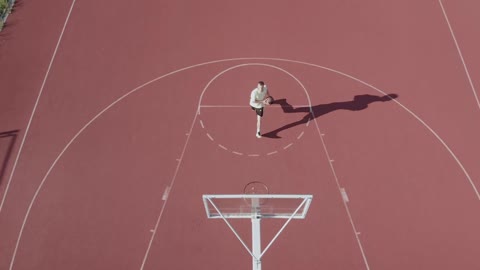 Dunk with the drone at the basketball court