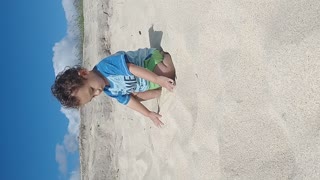 Baby in the sand