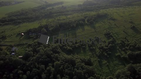 Aerial landscape with forests, fields and village in Russia