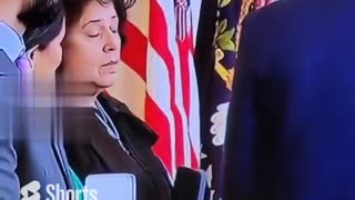 This woman's face 😅 when Biden gives her the award