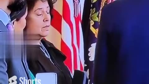 This woman's face 😅 when Biden gives her the award