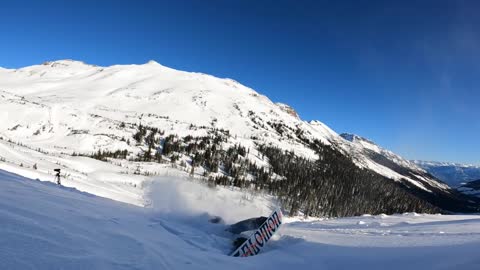 Man Faceplants While Doing A Snowboarding Backflip