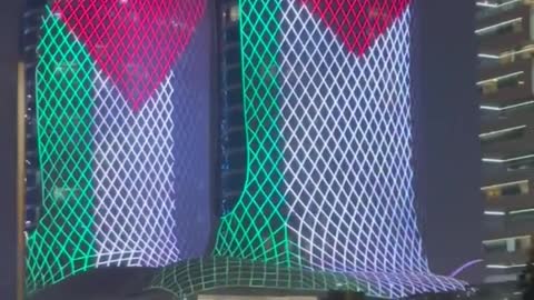 Al Jaber twin towers in Qatar’s Lusail city light up with the flag of Palestine to show solidarity