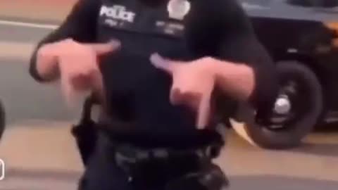 NYPD cop taunts gang member by throwing up rival gang signs