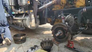 REMOVING THE WHEEL BEARINGS ON A FREIGHTLINER STEER AXLE