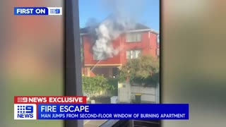 Man clinging to burning apartment building saved by hero neighbours _ 9 News Australia