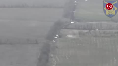 Russian armored personnel carrier with fighters in it was targeted by a kamikaze drone