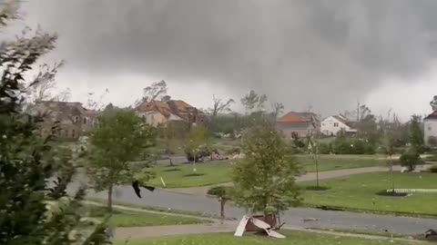 Man and Dog Make it to Safety Moments Before Devastating Tornado Hits