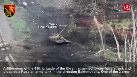 After their tanks are destroyed, Russians seek to drag their dead fellow soldiers away
