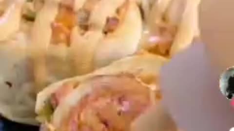 Very tasty spicy chicken roll cuts baked nicely then sprinkle mayonese on it