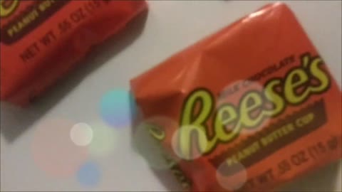 ASMR Reese's Peanut Butter Cup Candy Unwrapping Sounds Come with me as I unwrap 3 Candy Bars...mmmmm