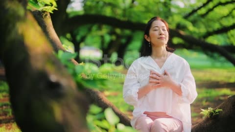 Woman meditating in nature .it is pease of mind