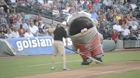 Fish Mascot Eats Worker