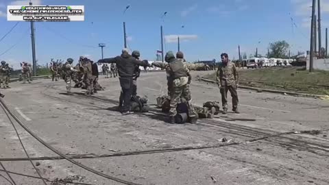 surrendering Ukrainian forces in the former boiler of the steel plant ASOW-STAHL