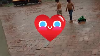 Baby playing at Rain