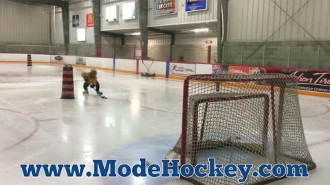 7-year-old shoots puck better than you!