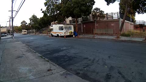 Homeless Guy Fixin RV roof early in the Mornin