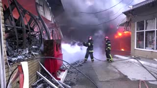 Massive fire engulfs street market in Kharkiv