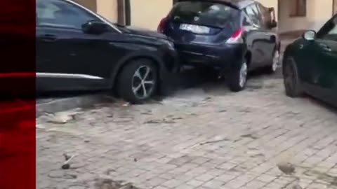 Cars are washed away in Italy as Storm Ciarán brings heavy rain.