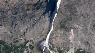 Here are stunning Yosemite aerial views of Wapama Falls and Bridal Veil Falls.
