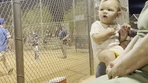 Baby Unsure How to High Five Woman With Missing Hand