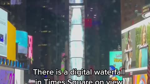 LetsΠThere is a digital waterfall in Times Square on view until August 21st
