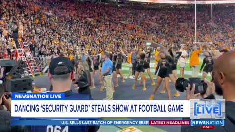 Dancing 'security guard' steals show at football game | NewsNation Live