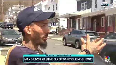 Man rescues neighbors from burning home