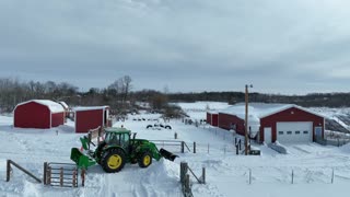 John Deere Tractor Pounding the SNOW Drifts