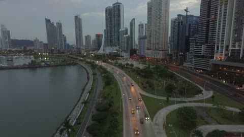 Driving in the city beside the beach and the waves