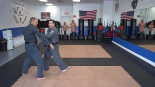 Correcting common errors executing the American Kenpo technique Entwined Maces