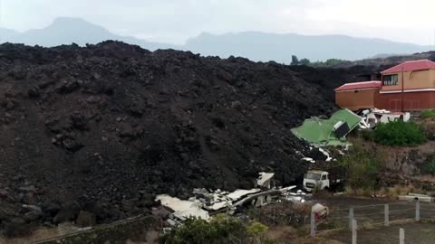 Drone footage captures volcano devastation as Spain pledges aid