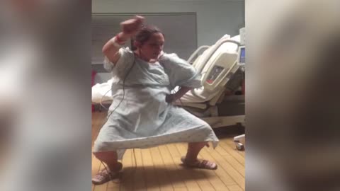 Expectant Mom Dances With Happiness At The Hospital