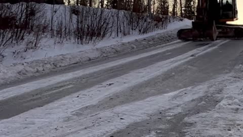 Sliding a Backhoe Down an Icy Road